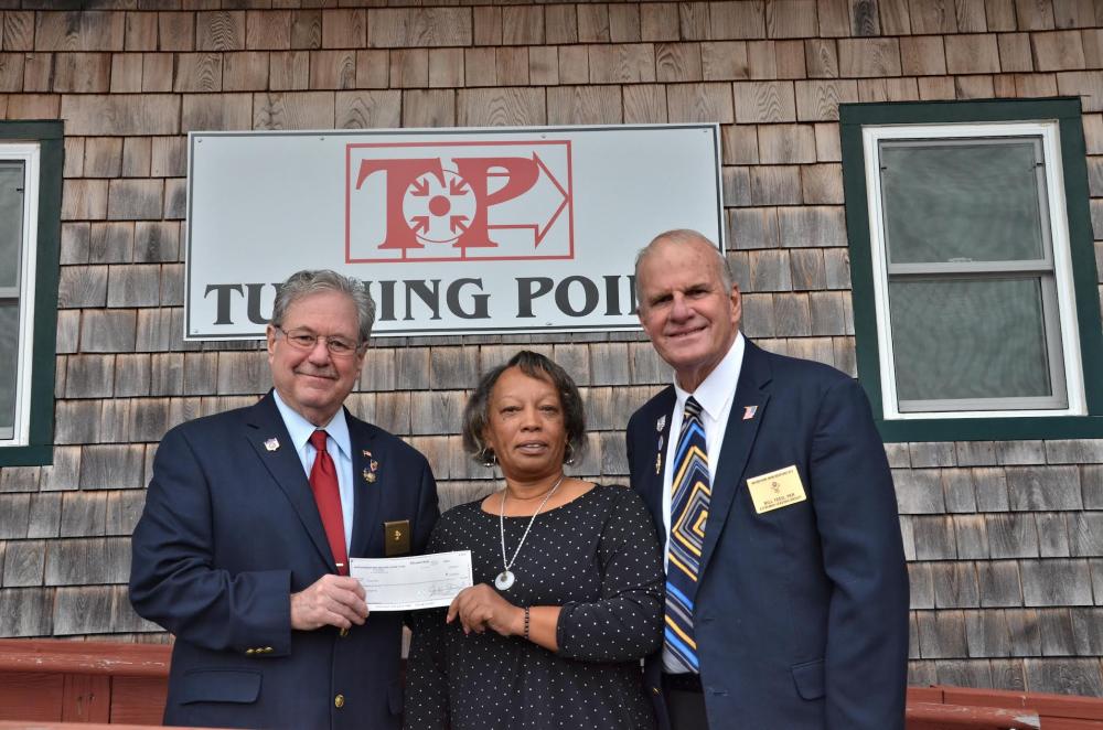 From left, Rick Duffy, Shirley Santos and Bill Teed the Wareham-New Bedford Elks recently awarded the Wareham Area Committee for the Homeless, also known as Turning Point, a check for $5,000 for rental assistance and home fuel assistance for neighbors in need. From left, Rick Duffy, Shirley Santos and Bill Teed. Photo courtesy: Turning Point
